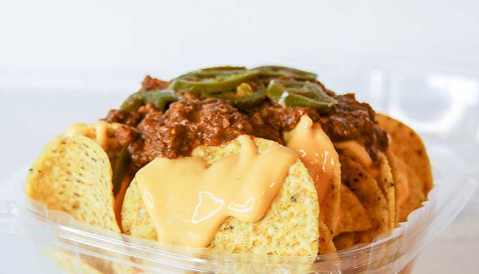 Nachos topped with cheese, taco meat and jalapenos from Frutti Labs in Kyle TX.